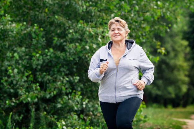 Woman jogging after bunion surgery